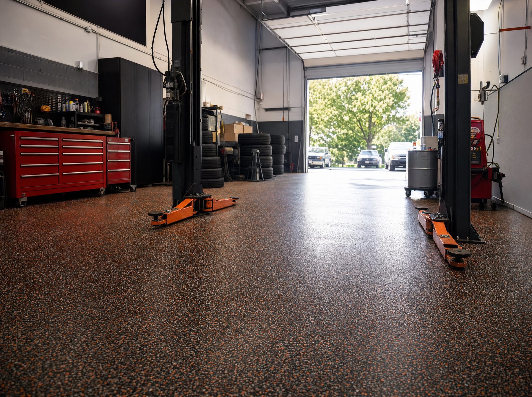 Auto shop bay with charcoal and orange flake floor